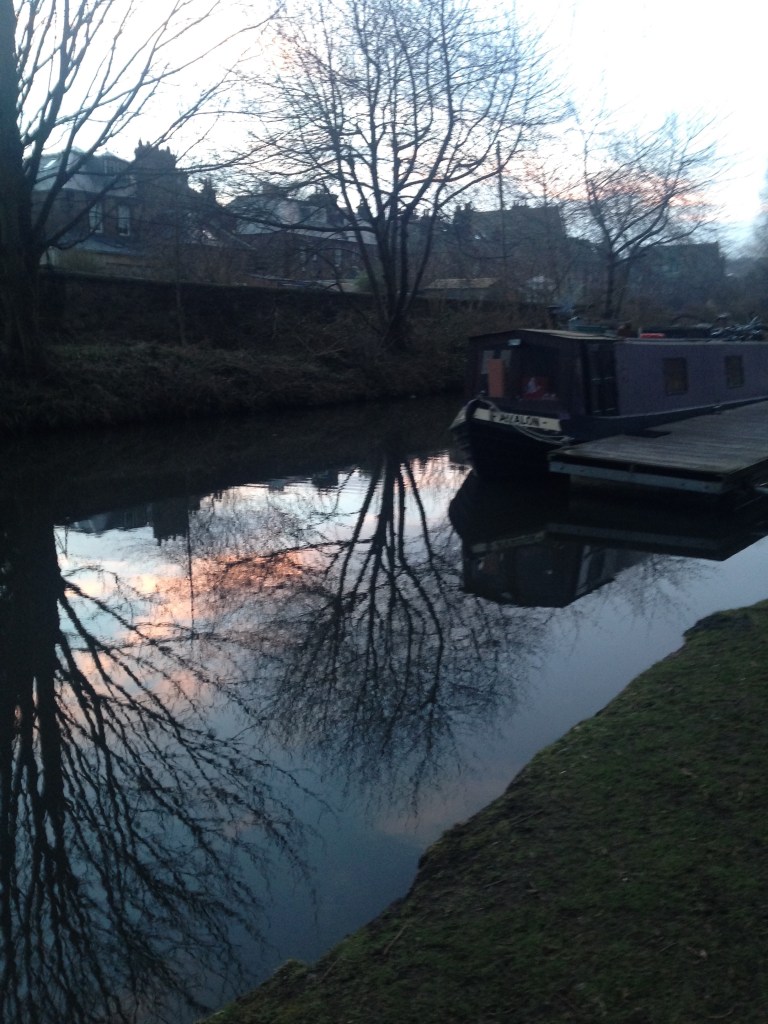 canal boat, reflective water