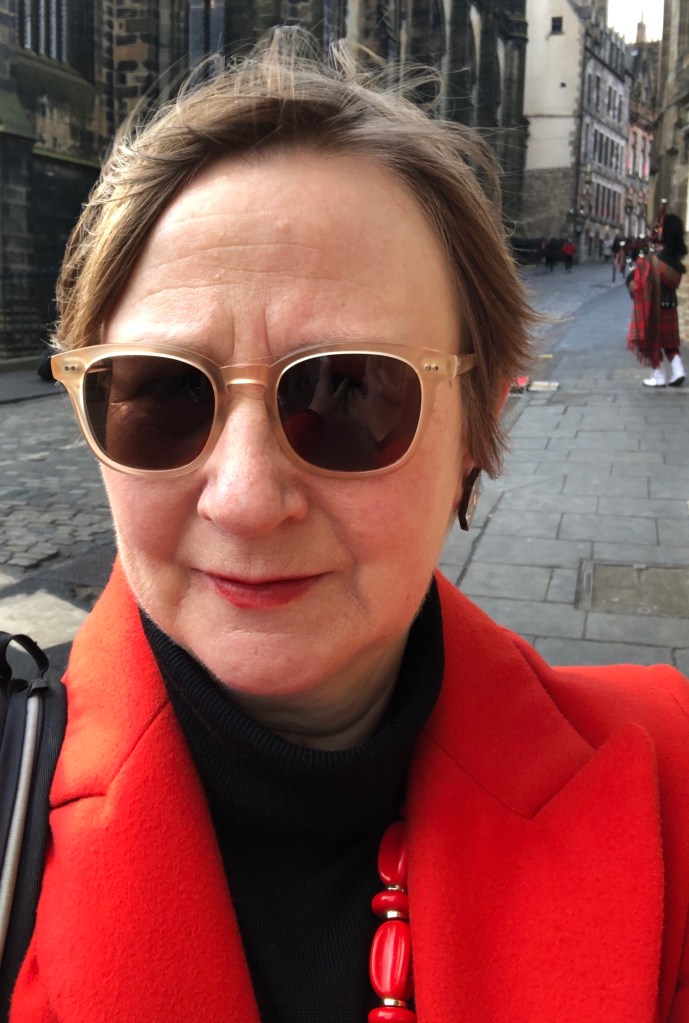 Blog author in a red coat 